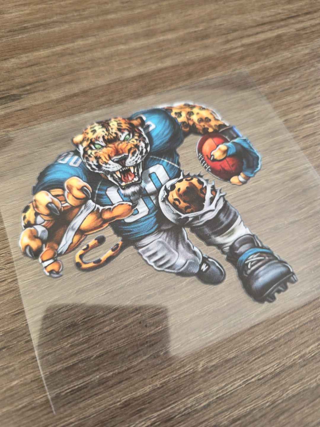 Running Football Player – 4x4 UV DTF Sports Decal