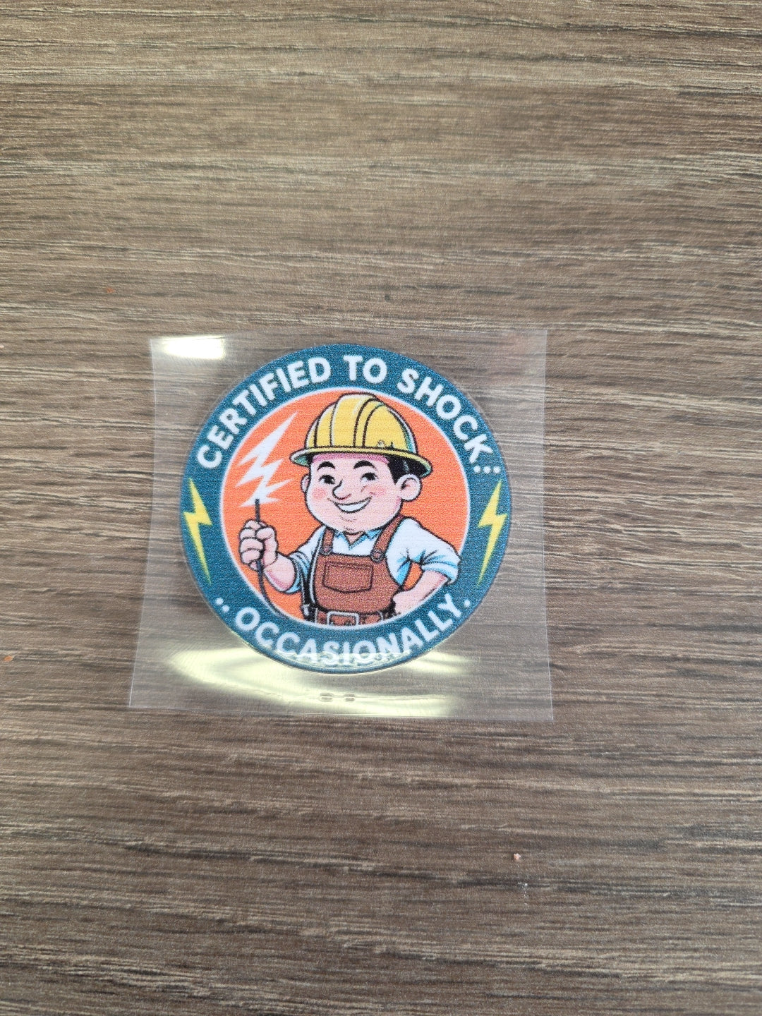 “Certified to Shock Occasionally” Decal – Electrician Hard Hat Sticker | UV DTF