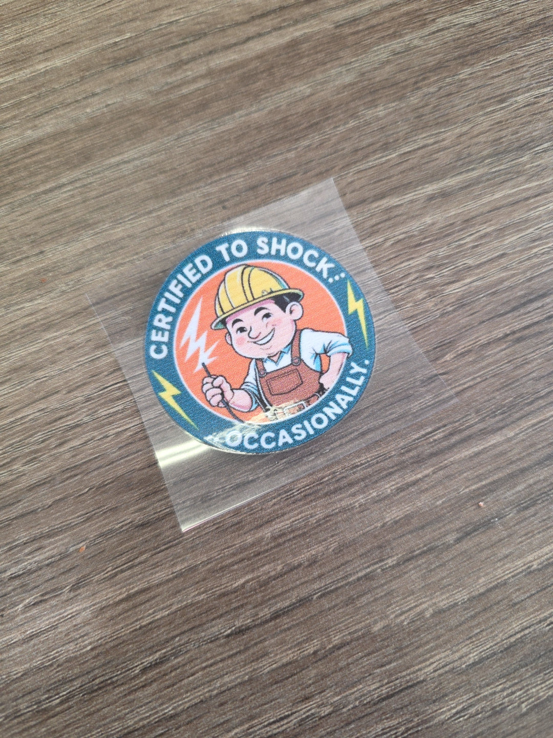 “Certified to Shock Occasionally” Decal – Electrician Hard Hat Sticker | UV DTF