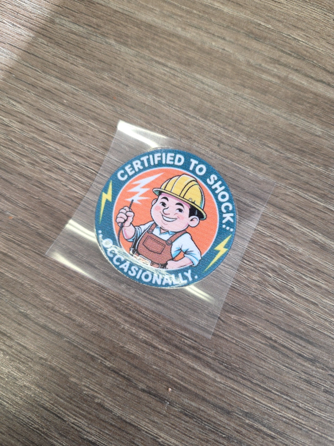 “Certified to Shock Occasionally” Decal – Electrician Hard Hat Sticker | UV DTF