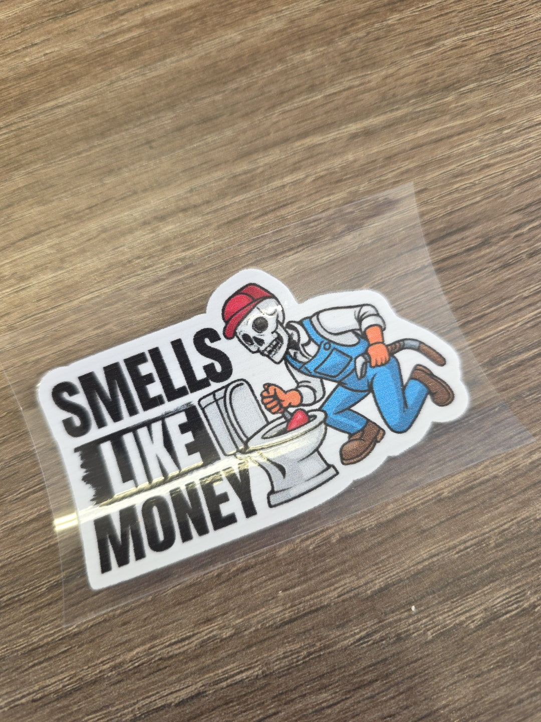 Smells Like Money Plumber Decal – UV DTF Hard Hat Sticker