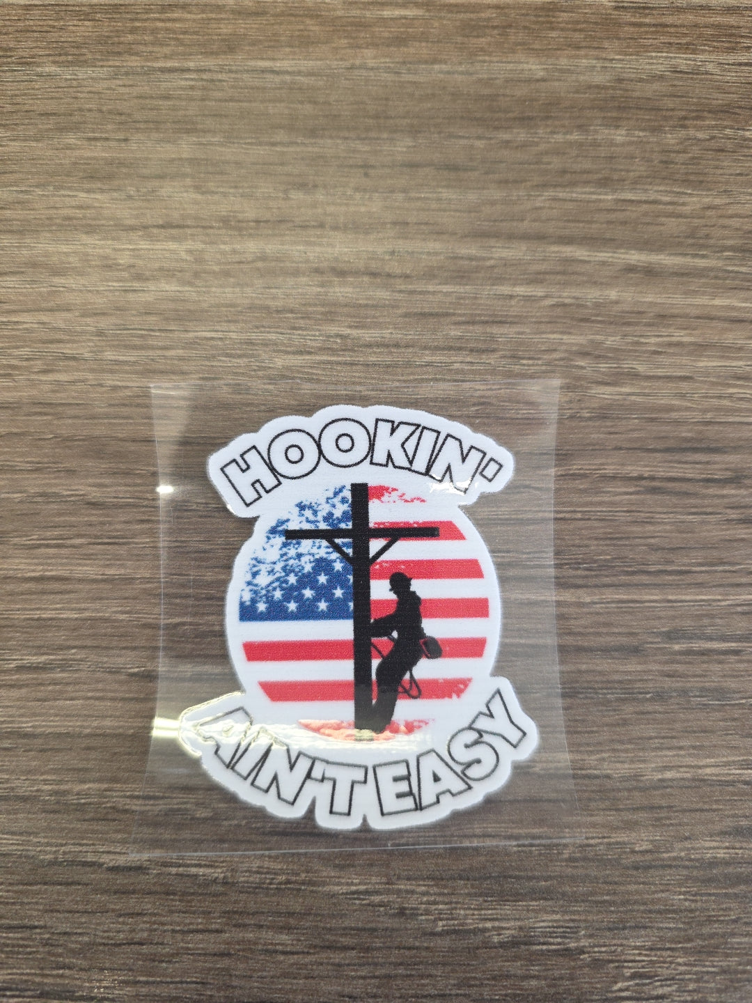 Hookin’ Ain’t Easy Lineman Decal – UV DTF Hard Hat Sticker